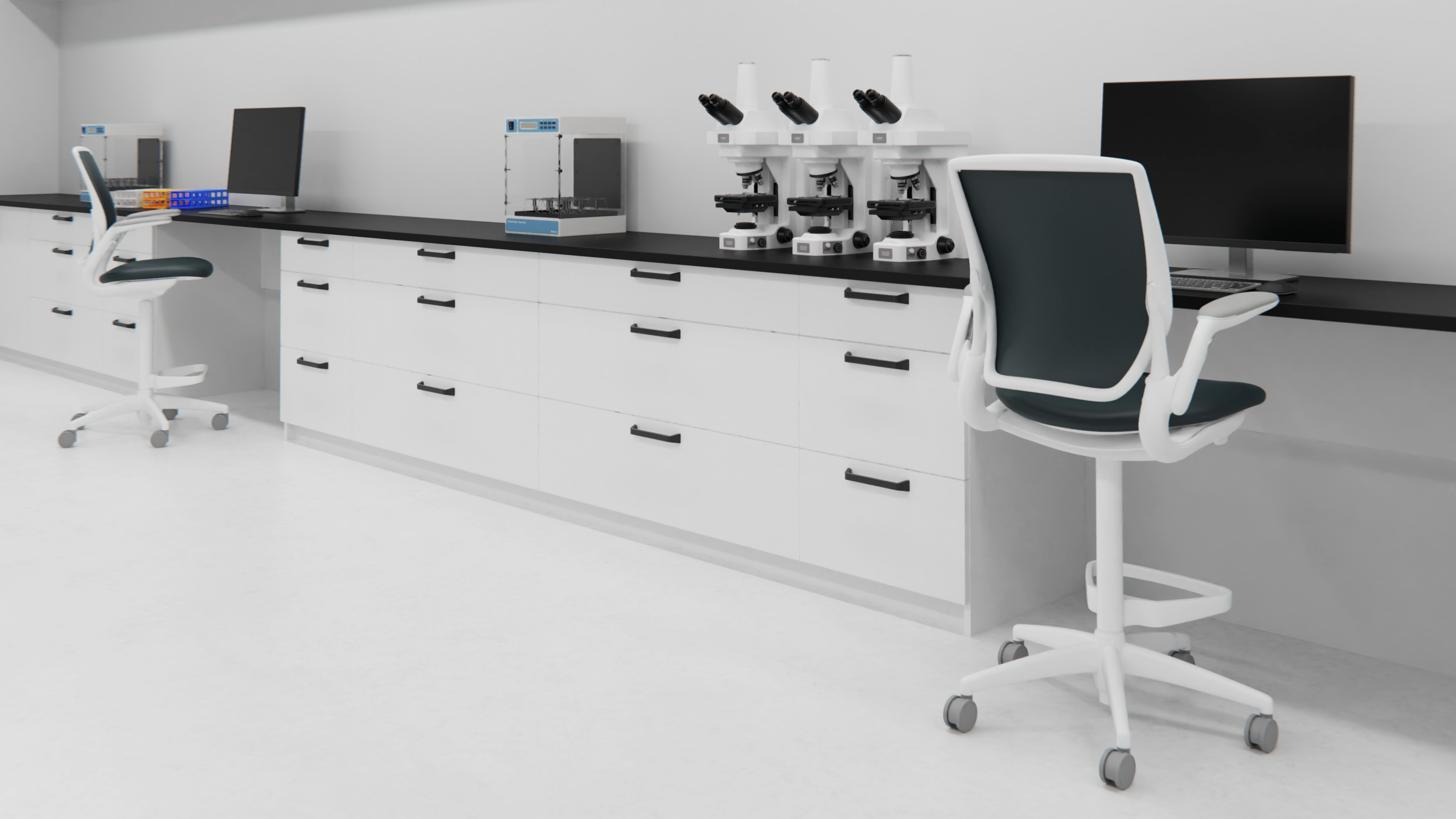 Back view of Humanscale Freedom gray fabric counter chairs with footrests