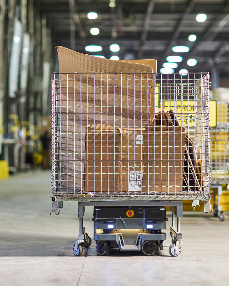 Cart with stacked cardboard boxes in a warehouse setting