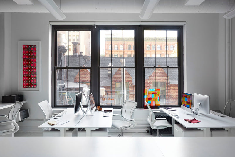 Modern small business office with Humanscale World task chairs with white